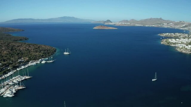 Amazing panoramic aerial 4k view from drone of beautiful bay of Bitez and Bodrum city in Bodrum on a bright and sunny day in Mugla province in Turkey