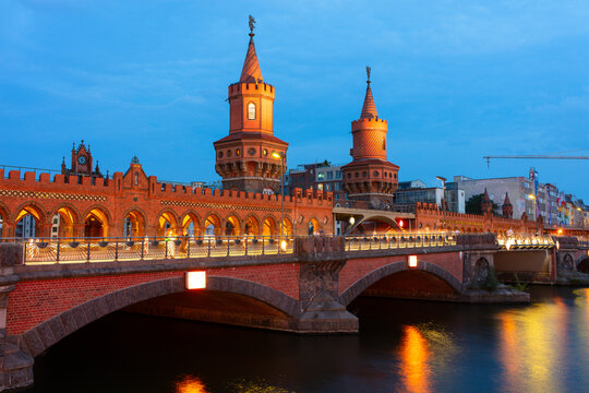 Oberbaum Bridge is a double-deck bridge over the River Spree and one of Berlin's landmarks. It connects the formerly divided districts of Kreuzberg and Friedrichshain.