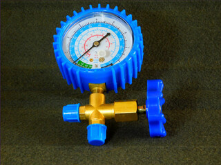 Closeup of a manometer isolated in the dark background