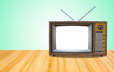 Vintage television with cut out screen and antenna on perspective wooden floor texture and mint green gradient wall  background.