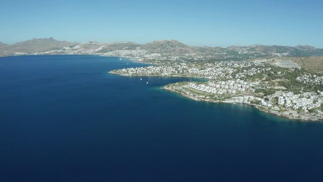 Amazing panoramic aerial 4k view from drone of beautiful bay of Bitez and Bodrum city in Bodrum on a bright and sunny day in Mugla province in Turkey