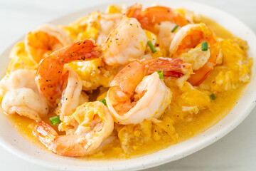 creamy omelet with shrimps or scrambled eggs and shrimps