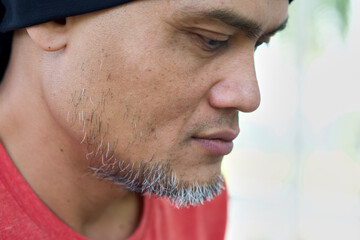 Obraz premium portrait of a person ,portrait of a man , Portrait of happy middle-aged man ,Middle aged man relaxing alone in nature. Relax on nature concept