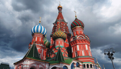 Fototapeta na wymiar Saint Basil orthodox church on Red Square under dramatic cloudy sky