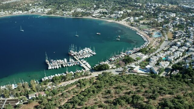 Amazing panoramic aerial 4k view from drone of beautiful bay of Bitez and Bodrum city in Bodrum on a bright and sunny day in Mugla province in Turkey