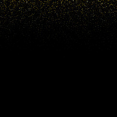 Gold glitter texture on a black background. Golden explosion of confetti. Golden grainy abstract texture on a black background. Design element.