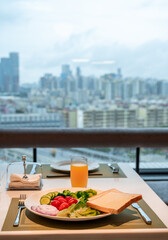 breakfast in front of a big window