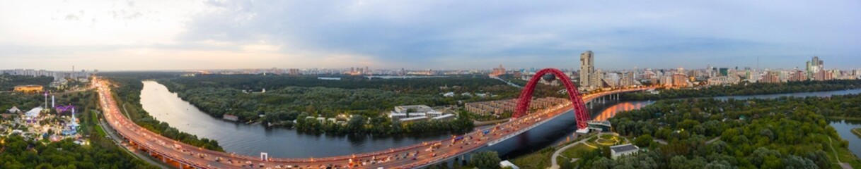 Panoramic view of Moscow on a summer evening, Russia. Picturesque region in the north-west of Moscow city. Zhivopisny bridge across the Moscow river.