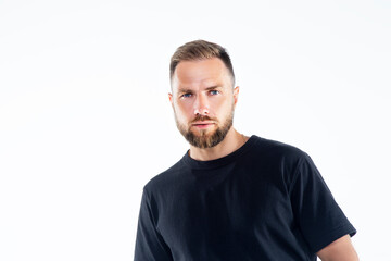 portrait of handsome man, person wearing beard, hair style, t-shirt. Copy space on white background