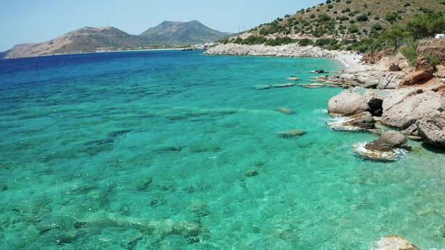 Amazing panoramic aerial 4k view of Bay of Ak�ab�k on Datca peninsula with crystal clear turquoise blue water in Mugla province in Turkey