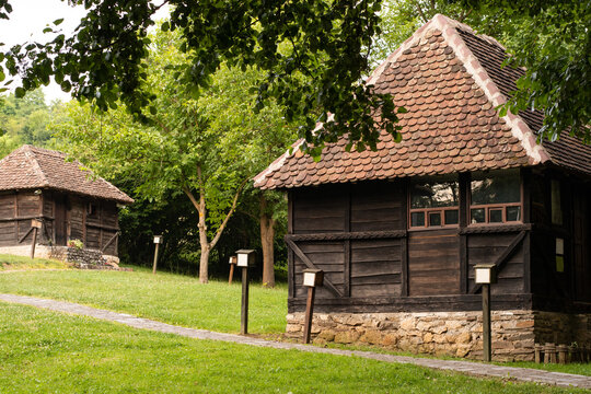 The traditional Serbian village Trsic - the most famous village in Serbia. Wooden ethno house in Trsic willage, memorial complex of Vuk Stefanovic Karadzic, cyrilic alphabet, born place, landscape.