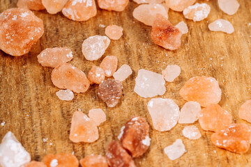 Himalayan pink salt close-up macro a wooden background