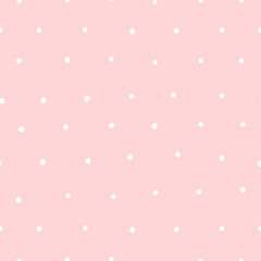 Cute seamless pink pattern with white dots. Polka dot background