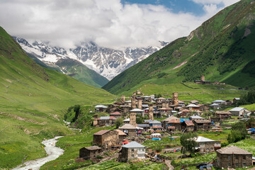 Fototapeta na wymiar Ushguli village, highest sattlement in Europe in summer or greeny season, Svaneti region in Georgia