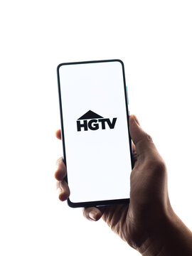 Assam, india - June 21, 2021 : HGTV logo on phone screen stock image.
