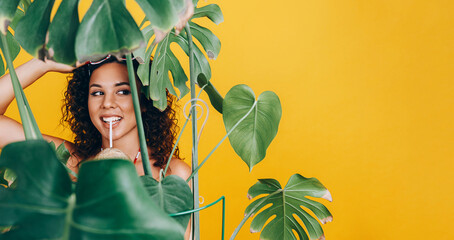 vacation concept in the tropics. young black girl in a swimsuit stylized as an American flag