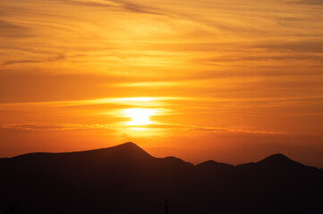 Silhouette of mountains at sunset in the carpathian mountains in summer