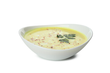 Plate of pumpkin soup isolated on white background