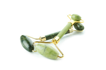Green face rollers isolated on white background