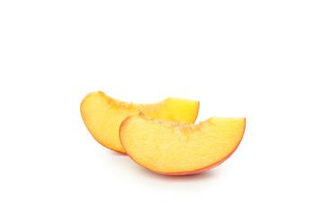 Slices of peach fruit isolated on white background