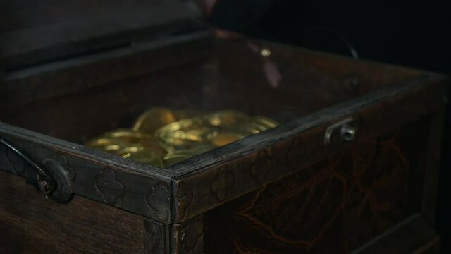 treasure chest with gold coins, smoke from inside
