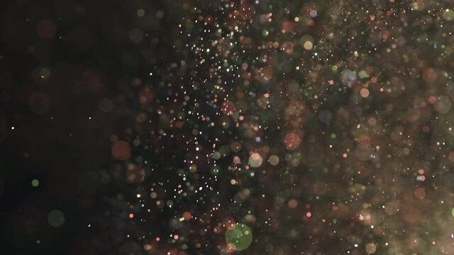 The magic fall of shimmering particles. slow motion