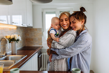 Young LGBT family spending time together