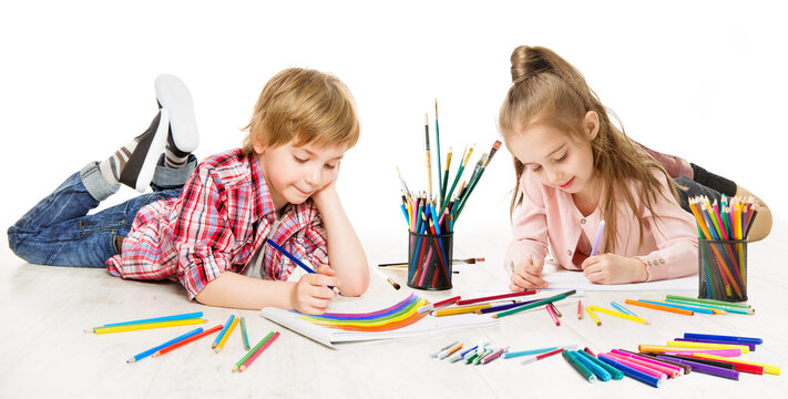 Kids Drawing and Painting. Child Creative Development. Preschooler Children Education and Active Playing lying down over White Background