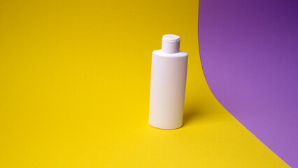 packaging of face or hand cream on colored background