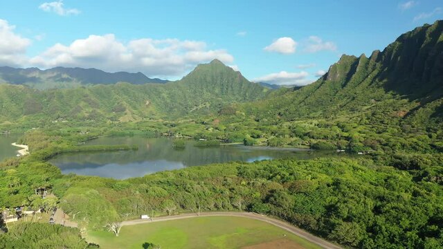 Aerial view of the ancient Moli'i fishponds with  reflections of the Koolau mountains in the ponds. The ponds are located near Kaneohe, on the island of Oahu, Hawaii, USA. 