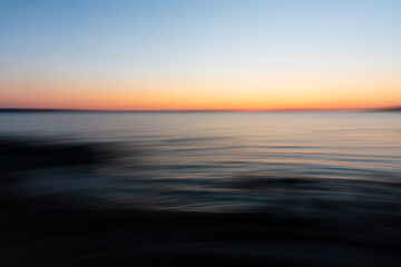 Obraz premium abstract icm landscape photo of sunset over the sea