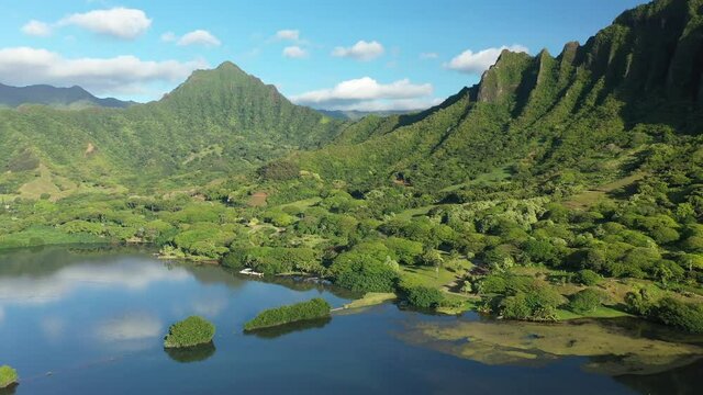 Aerial view of the ancient Moli'i fishponds with  reflections of the Koolau mountains in the ponds. The ponds are located near Kaneohe, on the island of Oahu, Hawaii, USA. 