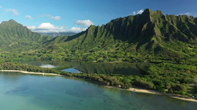 Aerial view of the ancient Moli'i fishponds with  reflections of the Koolau mountains in the ponds. The ponds are located near Kaneohe, on the island of Oahu, Hawaii, USA. 