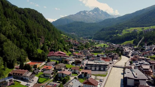 Flight over the village of Soelden in Austria - Solden from above - travel photography by drone