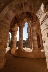Old ruined monastery building against starry sun