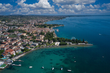 Historic town of Bardolino on Lake Garda, Italy. Bardolino, coastline aerial view panorama. Coastline on Lake Garda top view.