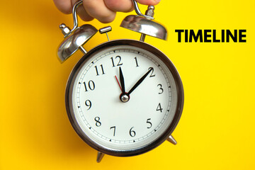 Retro alarm clock on bright yellow background. Timeline concept, optimization of work