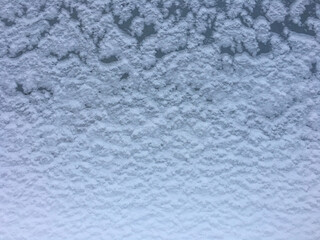 winter white snow covered wall. background for the label