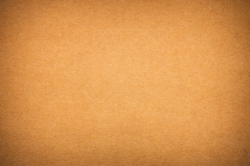 Brown paper or cardboard texture background.
