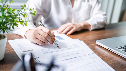 Auditor or internal revenue service staff, Business women checking annual financial statements of...