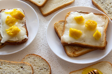Food photo white bread toast with melon and cottage cheese with mango