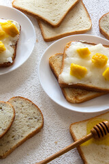 Food photo white bread toast with melon and cottage cheese with mango