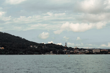 View of the mountains and lake Annecy in Haute-Savoie in France in cloudy weather in summer. Water landscape. 