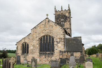 Fototapeta na wymiar Felkirk, West Yorkshire, United Kingdom - August 18 2021: Historic St Peter's church in Felkirk, United Kingdom. 