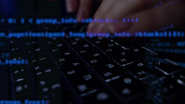 Alternative cinematic macro of programer's woman hands busy working on latest innovative sophisticated technology laptop or computer keyboard with augmented reality holograms for realization of new