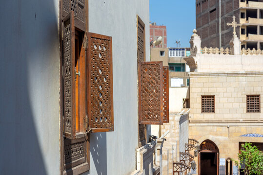 The shutters on windows on facae of the famous Coptic Hanging Church (St. Virgin Mary's) in Coptic Cairo