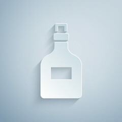 Paper cut Alcohol drink Rum bottle icon isolated on grey background. Paper art style. Vector