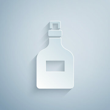 Paper Cut Alcohol Drink Rum Bottle Icon Isolated On Grey Background. Paper Art Style. Vector