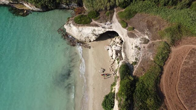 Baia Mulino d'Acqua in Otranto (Italy) aerial view at sunrise shot with drone - 4k