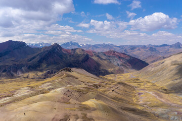 Fototapeta premium Rainbow Mountain, is a mountain in the Andes of Peru with an altitude of 5,200 metres above sea level. It is located on the road to the Ausangate mountain.
